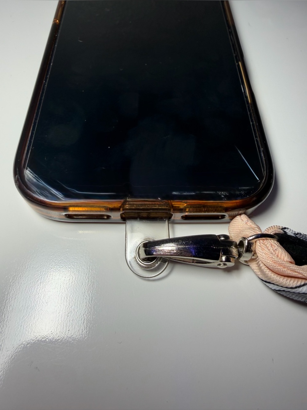 Silk-Twilly Pink and Black tied onto a leather lanyard holder/cell phone cord. - Picture 2 of 12